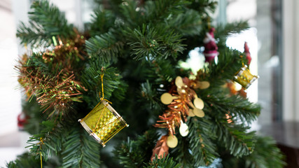 Ornament on a Christmas tree with Santa and colorful drums.