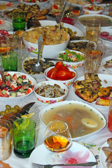 Festive table with delicious dishes. Many food on table for family holiday