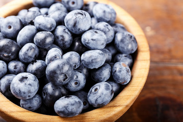 blueberries on wooden background