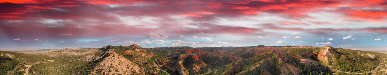 Naklejka na ściany i meble Panoramic sunset aerial view of amazing Bryce Canyon Mountains and Rock Formations in summer