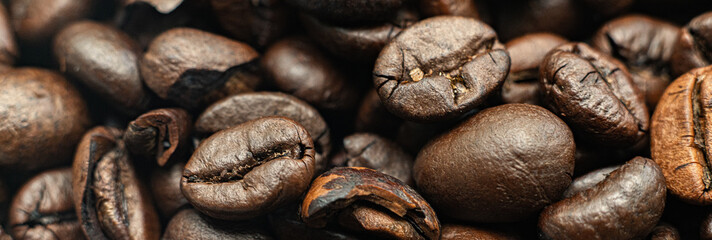 macro of roasted coffee beans background, the texture pattern