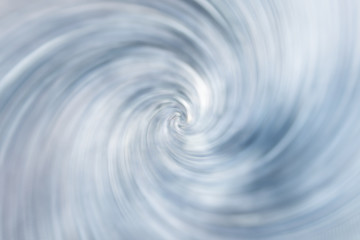 Spiral blue white blurred gradient background