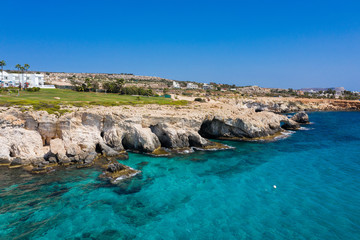 Sea caves in Ayia Napa resort town, Cyprus, view from drone