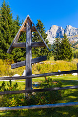 Fototapeta na wymiar Alpine village of Carezza in the Dolomites with views of Mount Roda di Vael
