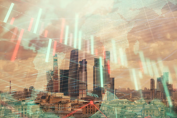 Double exposure of financial graph and world map on city veiw background. Concept of financial market research and analysis