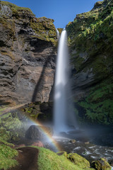 stunning view of the Kvernu Foss waterfall in a hidden valley of south western Iceland