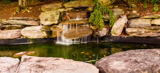 Fototapeta na wymiar Waterfall in the Park