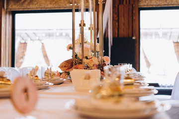 high decorative candles table decoration at a wedding