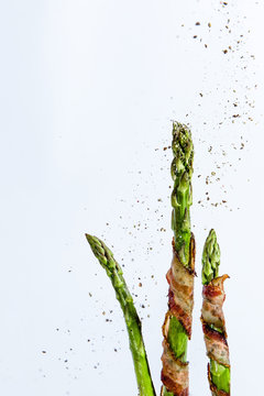 Stalks of asparagus wrapped in bacon