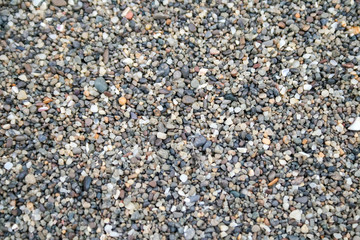 Background of small multicolored sea pebbles