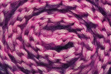 Violet textured Knitted background. Close up of  wool fabric texture.