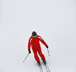 Portrait of Skier with ski on the background of mountains