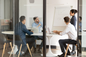 Young diverse business team brainstorming meeting in office