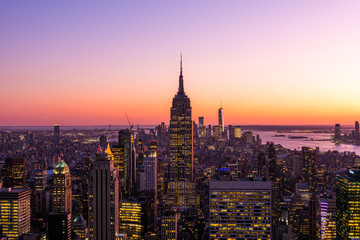 New York City skyline with cityscape and skyscraper in Manhattan at sunset. - obrazy, fototapety, plakaty