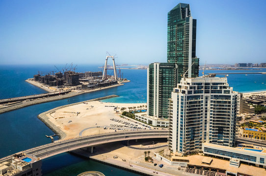 Construction of modern skyscrapers in Dubai Marina on the shore of the Arabian Gulf. Dubai. In the summer of 2016.