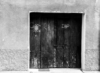 wooden door with horoscopes