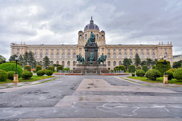 Fototapeta premium Vienna, Austria - April, 2019. Hofburg, palace and park complex of the Hofburg, Austria. Streets of Vienna's old town with tourist attractions. Square of the imperial palace on a rainy day