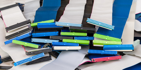 Internal parallel bus attachment. Flat computer cables with plastic connectors. Interface standard for connection of data storage devices such as optical or hard disks. Integrated drive electronics.