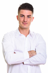 Close up of young handsome man with arms crossed