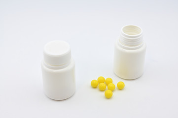 Photo of medicines with packaging, vitamins on a white background. Healthy food concept.