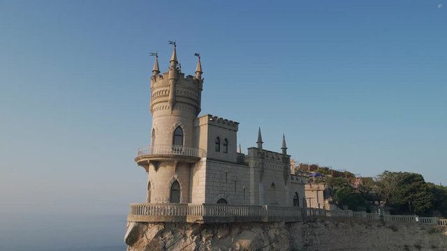 Aerial view Crimean well-known Swallow nest Castle at golden dawn