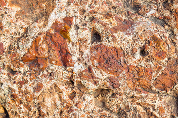 the structure of the stone, such as basalt or granite 