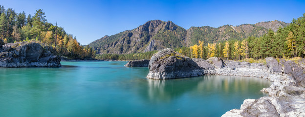 Beautiful panoramic view of a small cove on the Katun river in Altai mountains, Siberia, Russia. Fall 2019