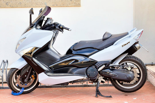 Two-cylinder scooter Yamaha Tmax; parked on the seafront in Rome,Rome; Italy - June 27; 2018