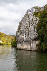 Fototapeta na wymiar Nature reserve at Danube river breakthrough near Kelheim, Bavaria, Germany in autumn with limestone rock formations and plants with colorful leaves, autumnal impressions