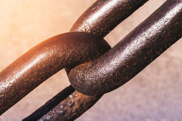 close up shot to a stretched chain.
