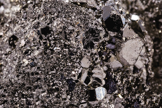 Iron pyrite nugget or iron expert, silver metal in the raw state. Brazilian nugget. Concept of mineral extraction or geology of Brazil. Natural crystalline stone texture from Brazil.