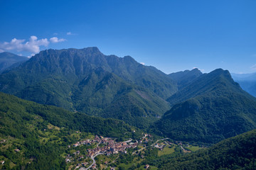 Naklejka na ściany i meble Aerial photography. Panoramic view of the Alps north of Italy. Trento Region. Great trip to the Alps.