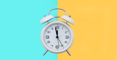 old alarm clock just before 12