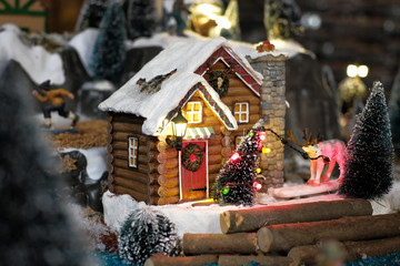 Miniature of Christmas scene old wooden house with winter concept, Christmas holidays