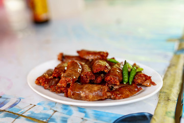 beef with vegetables and tomato sauce