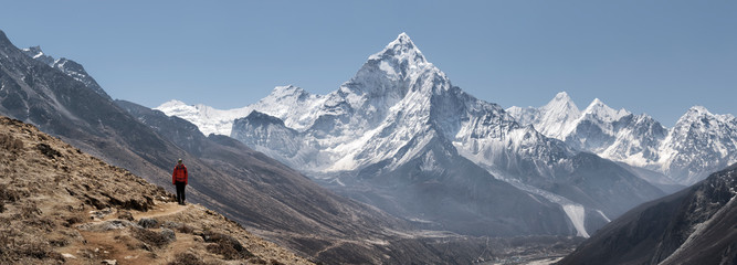 Young woman hiking in Sagarmatha National Park, Everest Base Camp trek, Nepal