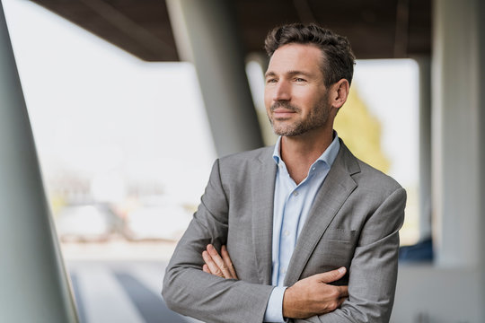 Portrait of confident businessman outdoors