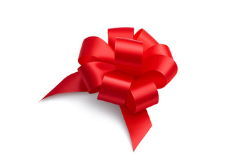 Side view on big beautiful red creative decorative ornate festive gift unusual bow with many petal...