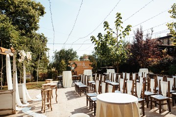 Wedding setting for marriage ceremony in a garden.