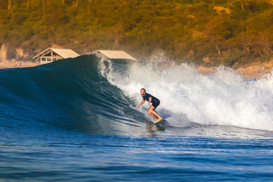 Indonesia, Lombok, surfing man