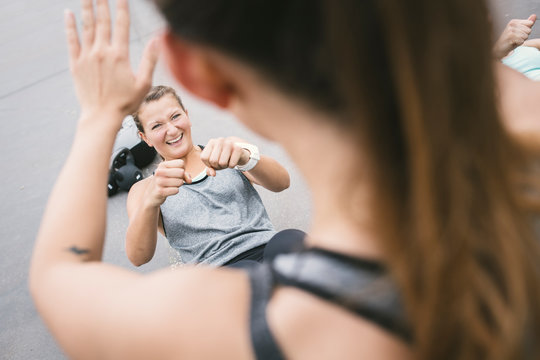 Women having an outdoor boot camp workout