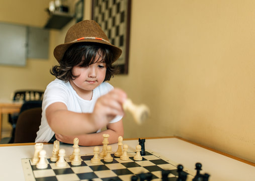 Boy playing chess