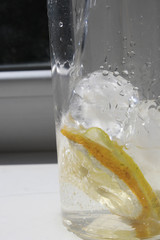 Glass with ice and lemon