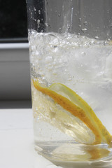 Glass with ice and lemon
