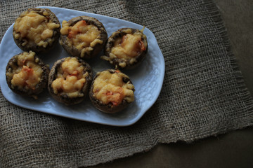 Baked mushrooms on a white plate