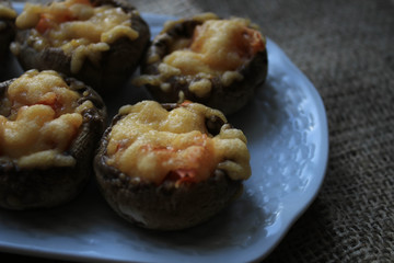 Baked mushrooms on a white plate