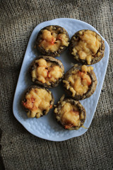 Baked mushrooms on a white plate