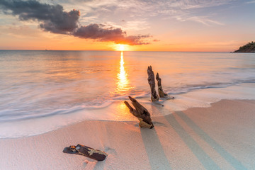 Tropical sunset on white sand beach, Caribbean, Antilles