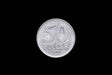 Old Hungarian 50 Filler coin from 1976, reverse. Isolated on black background