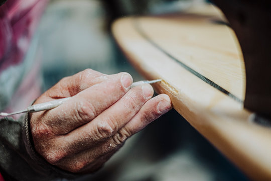 A local surf shaper from Tenerife working on a new surfboard